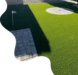 paving stones installation next to putting green designs